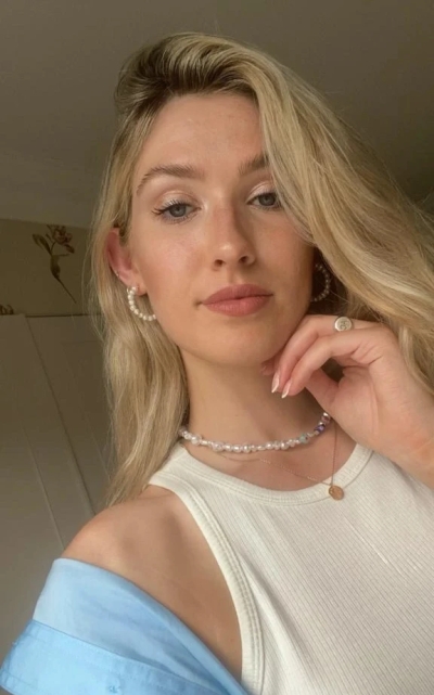 Blonde - cute girl flicks herself