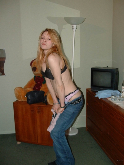 Red-haired girl posing