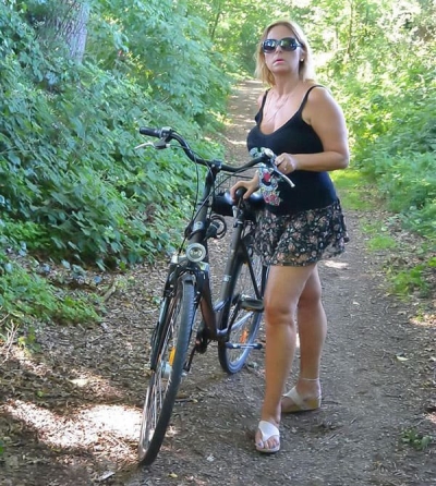 Busty milf on a walk in the forest