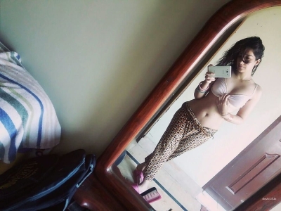 Naked Egyptian woman takes pictures at home