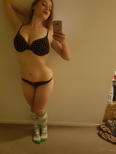Cutie posing and caressing pussy