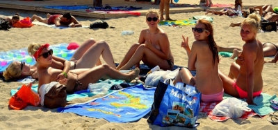 Naked girls with big tits on the beach